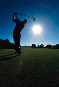 sunset golfer